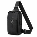 Sac bandoulière 18 x 7 x 30 cm noir en matière synthétique avec poches zippées