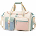 Sac de voyage 45 x 22 x 28 cm en textile beige rose bleu avec bandoulière réglable et poches zippées
